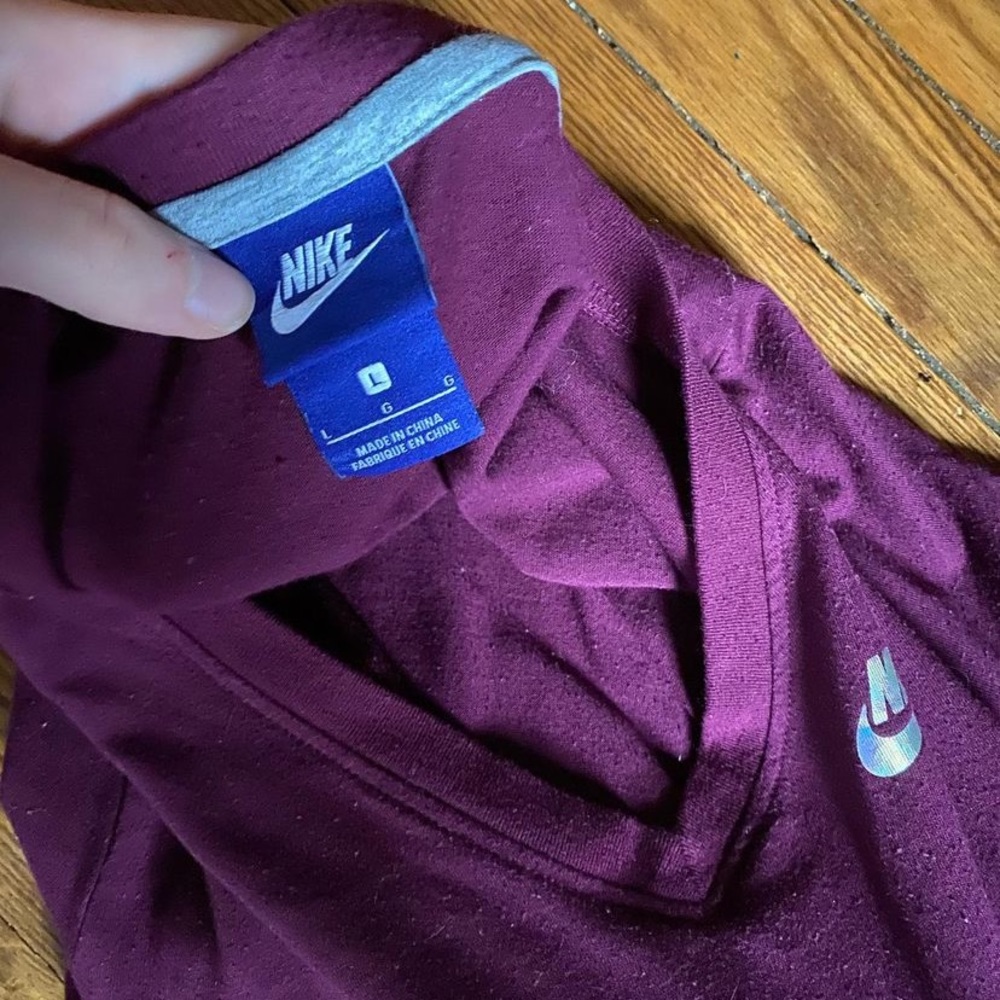 Maroon Nike long sleeve w/ holographic text